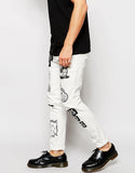 Skinny Jeans With Printed Badges